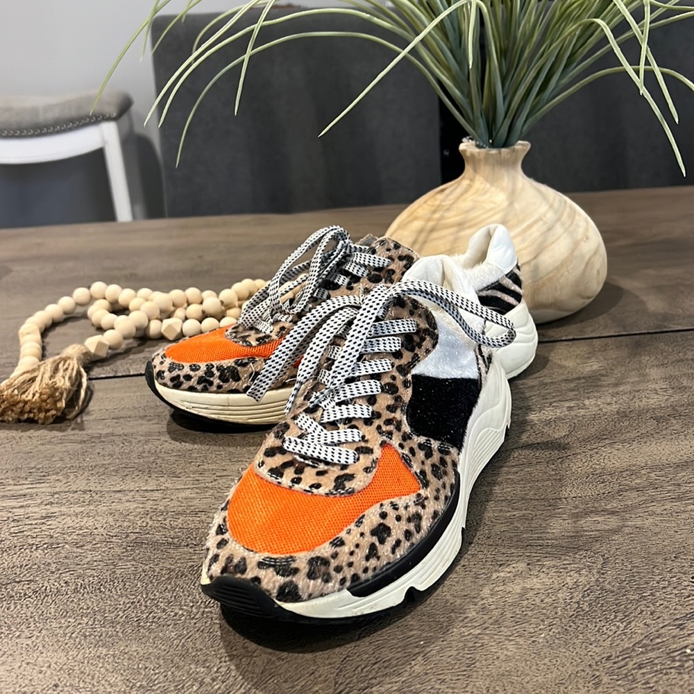 Fuzzy animal print sneakers